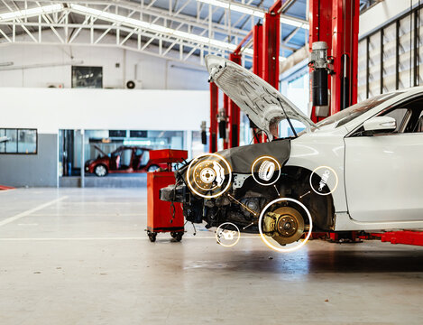 Automotive Drivetrain, Wheel, Brake and Suspension Inspection in Professional Car Repair Service Center