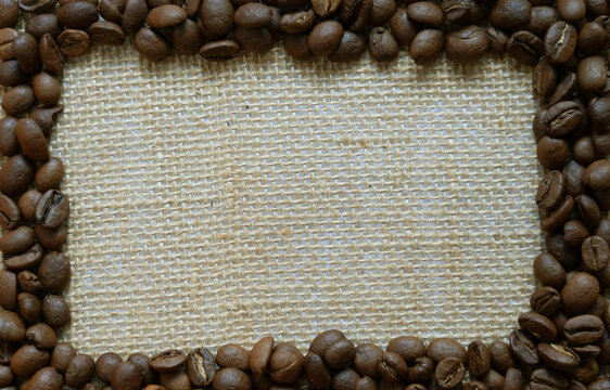Coffee bean frame with burlap background