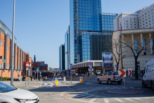 Poznan city center downtown at daytime in winter. Stary Browar mall, nearest hotels and skyscrapers and busy road. Everyday life at Greater Poland town on 4th of March, 2026 in Poznan, Poland