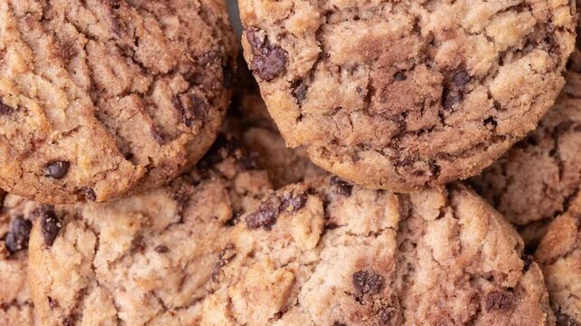 Closeup top view of chocolate chip cookies. Cookies backdrop