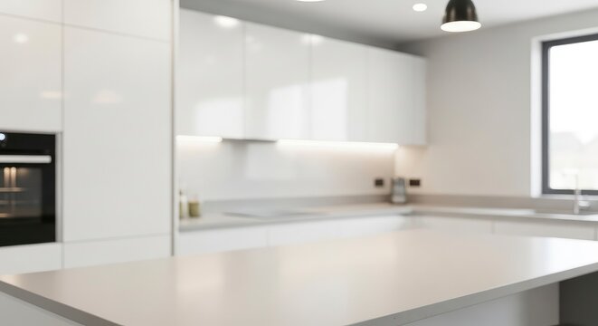 Blurred Modern White Kitchen Interior Background with Kitchen Island Countertop in Focus, Minimalist Design