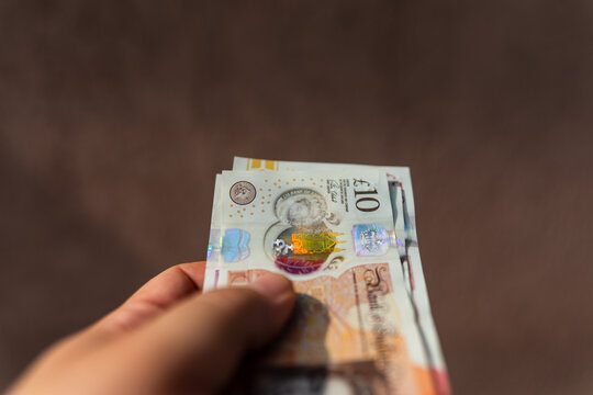 British pound sterling GBP banknotes representing United Kingdom currency finance banking and money concept