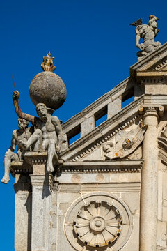 Classical statue  on an ornate building facade
