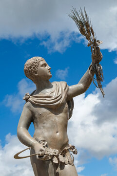 Classical Statue Against Blue Sky