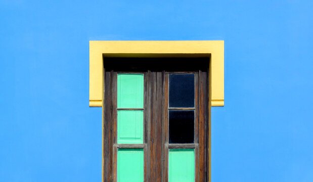 Tenerife architectural detail with yellow frame and blue wall