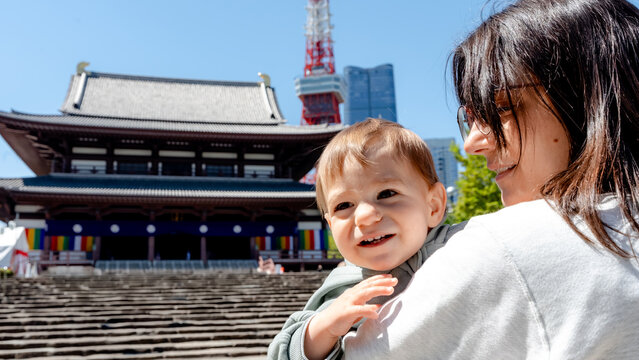 Family visit at Zojo-ji Temple with Tokyo Tower view