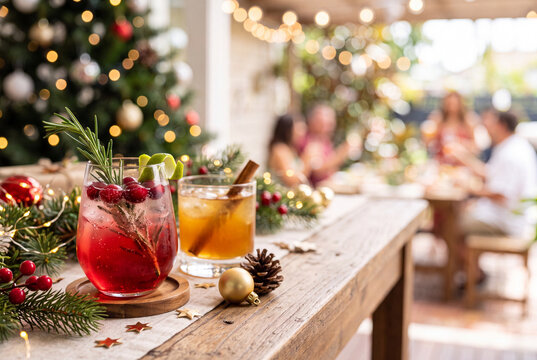 Festive holiday table with cranberry cocktail and bourbon drink for christmas brunch gathering and seasonal party background