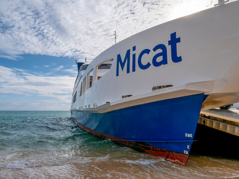 The Micat vehicle ferry docked on the sandy beach of Moreton Island