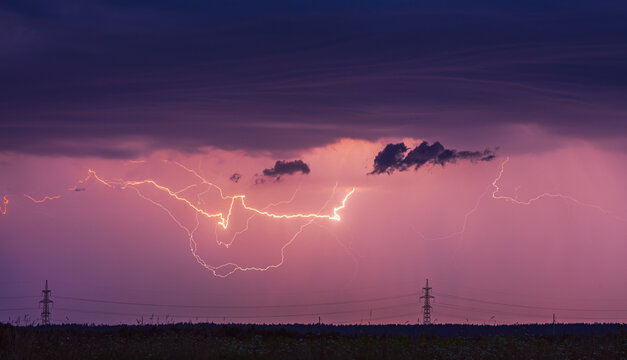 Storm, lightning strike in the horizon, thunder concept