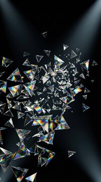 Floating glass pyramids with rainbow light dispersion against dark background. Futuristic and elegant abstract composition. Ideal for luxury branding or tech wallpapers.