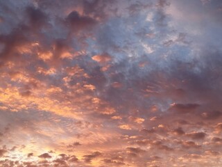 Fototapeta premium fantastic orange cloudy sky after the sunset