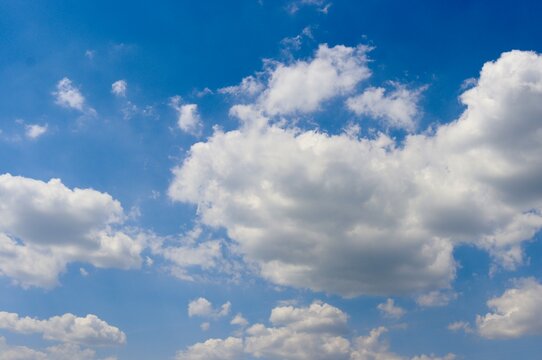 The white clouds in the blue sky.