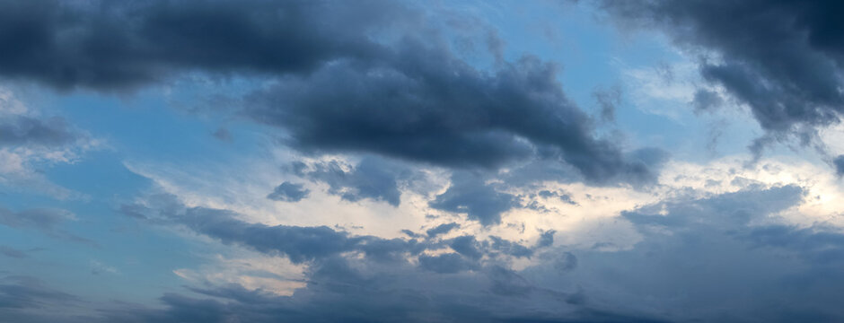 Dramatic sky with heavy dark clouds before storm panoramic view