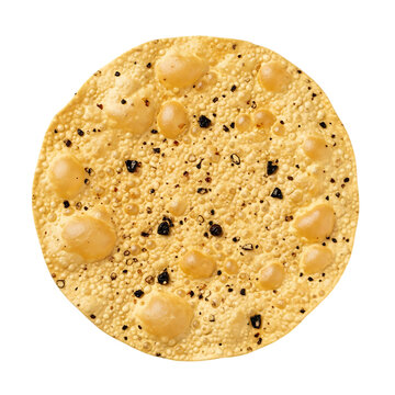 Single round crispy papadum cracker with visible black peppercorns and textured surface, isolated on a white background, down view isolated on a transparent background