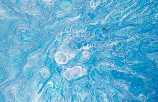 Abstract blue marbled fluid texture with swirling cells, delicate veins, glossy liquid patterns