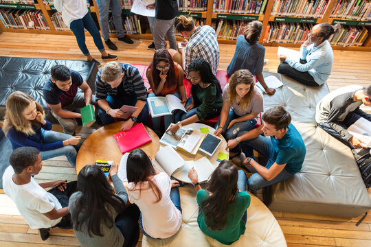 Students collaborating in library space.