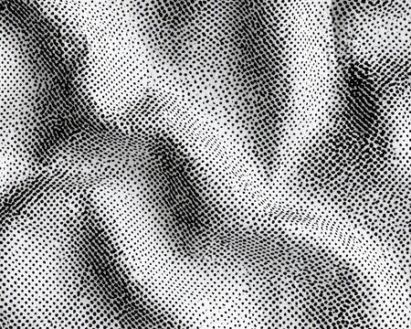Abstract halftone dot pattern on a wrinkled fabric texture
