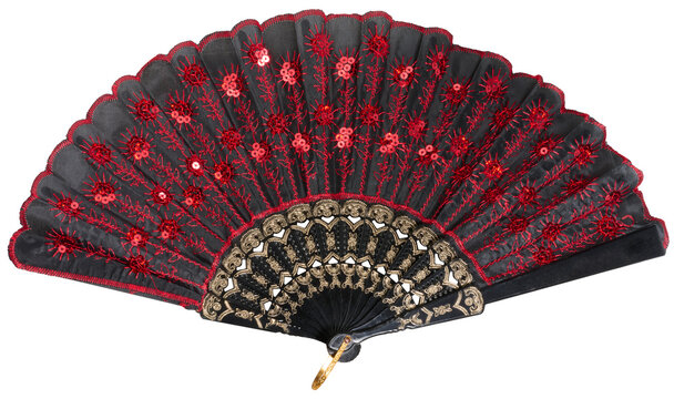 Black and red Spanish hand fan with embroidery and sequins, isolated background