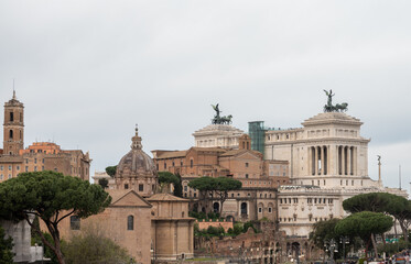 Obraz premium Architectural history in details of ruins, old buildings, walls, amfitheatres, arches in old part of Rome, dated from 300 BC, guided tours in Rome, Italy