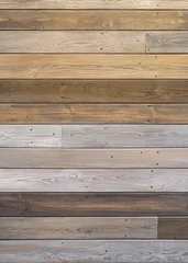 Weathered wooden plank wall with mixed tones © Evgeniia Biriukova