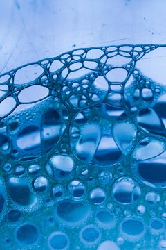 Abstract Macro Photo of Foam Bubbles in Blue Tones