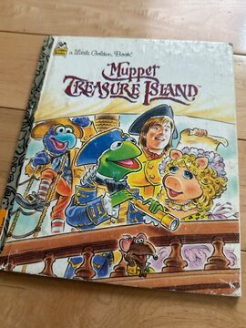 Muppet Treasure Island, A Little Golden Book Vintage Children&rsquo;s Book Displayed in Alberta, Canada. August 2, 2026. Grande Prairie, Alberta, Canada. For editorial use only.