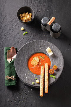 Professional and healthy tomato soup as top chef-crafted dishes.