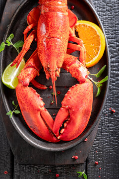 Boiled and spicy lobster prepared in orange sauce.
