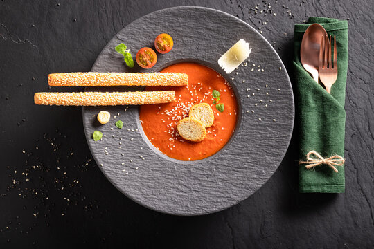 Exquisite tomato soup as culinary artistry in top kitchen.