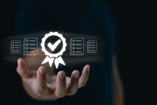 Person hand holding quality assurance, checklist certification concept, digital validation, compliance, approval, performance standard, trust, accuracy, business quality control, professional audit.