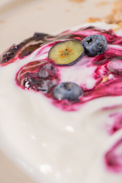 Mini cheesecake with blueberry compote macro view