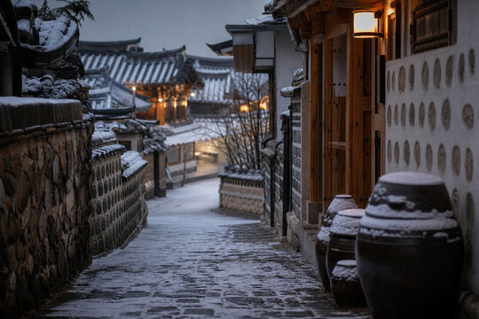 Onggi earthenware jars in a overcast winter Korean hanok alley