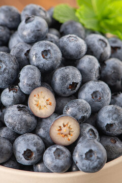 Fresh juicy blueberries with slice details macro