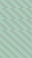 Seamless teal and green fish scale pattern background