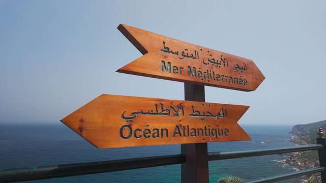Iconic sign at Cap Spartel in Tangier, Morocco, marking the meeting point of the Mediterranean Sea and Atlantic Ocean