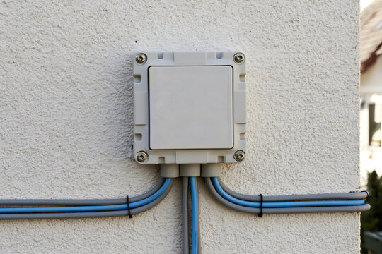 Fibre broadband conduit entrance and termination box on the house wall