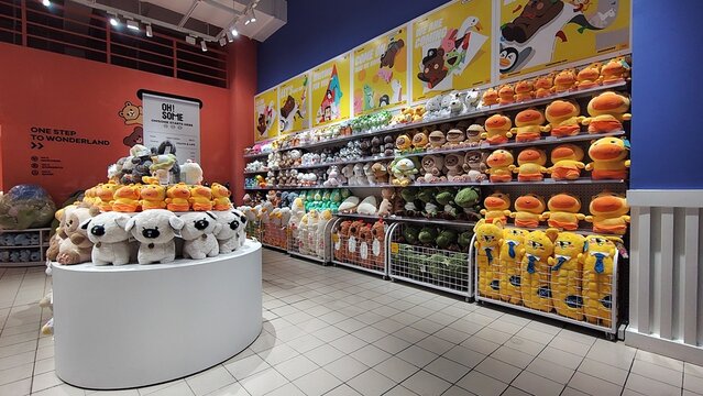 Interior view of a retail store displaying a large collection of Cute Dolls and merchandise in OH1 SOME Store