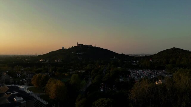 Rising Drone View of Sheshan Mountain at Golden Hour