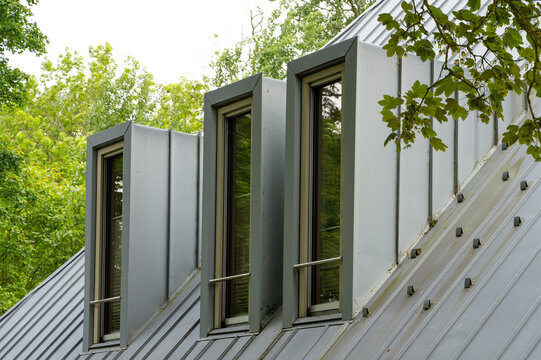 Modern Dormer Windows on a Standing Seam Metal Roof