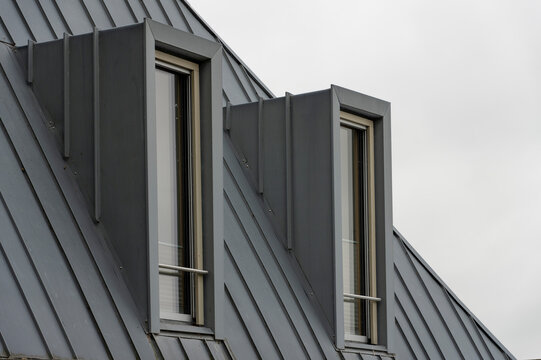 Modern Dormer Windows on a Standing Seam Metal Roof
