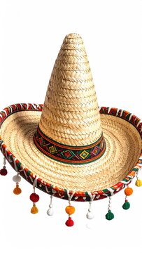 A conical woven straw hat with colorful pompoms and decorative trim