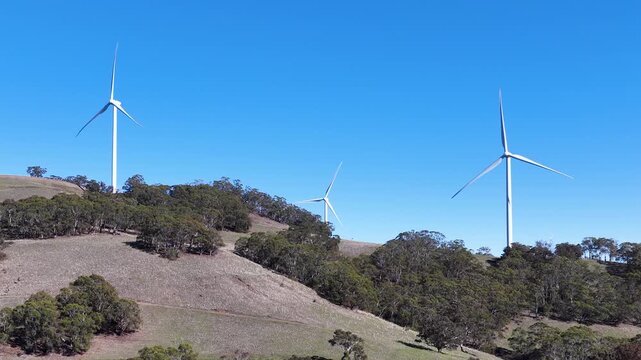 Wind Turbines Rotating on Green Hills in New South Wales