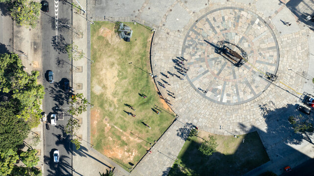 Arcos da Lapa featuring its iconic white arches stretching across the urban landscape with surrounding buildings and clear sky in Rio de Janeiro, Rio de Janeiro, Brazil. Aerial view.