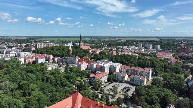 Stargard Poland city center church apartments parks circle 1. Northern Poland in 8th century. Historical stronghold, defensive walls, gates towers. WW II POW camp controlled by Germany. Brick church.