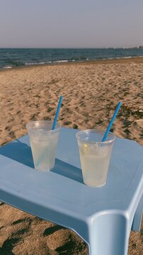 Refreshing Lemonade on Beach: a Summer Vibe Experience