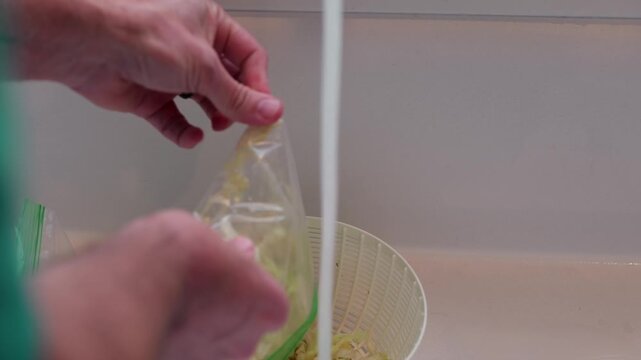 Man suffering severe stomach pain and cramps after eating shredded iceberg lettuce contaminated foodborne illness, illustrating salad recall symptoms