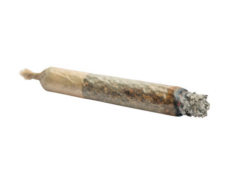 Finished rolled cannabis joint with ash on tip isolated on transparent background