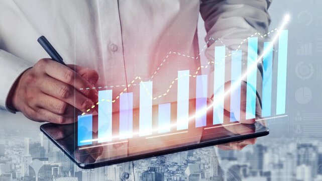 A business professional engages in data analysis with a digital tablet in a modern office, showcasing growth charts and visual elements that illustrate progress. Copula