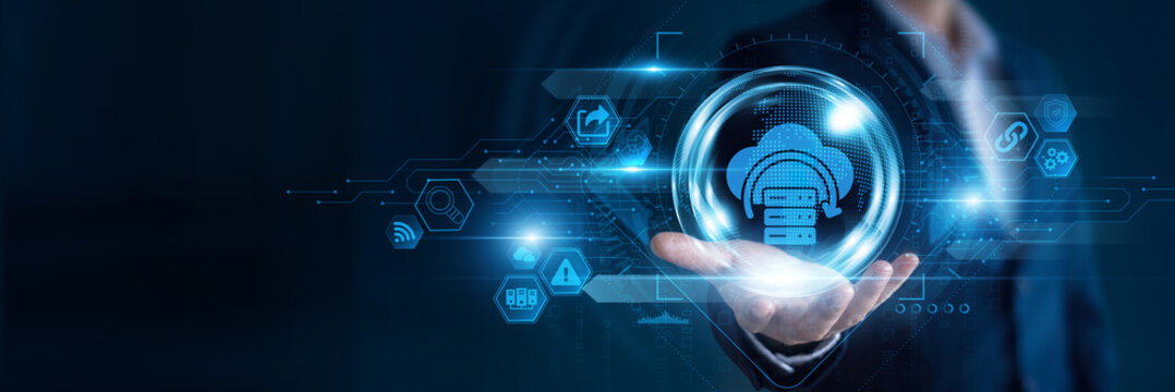 Businessman hand hold Backup and global networking data, protecting critical information, securing digital assets, ensuring disaster recovery, improving business continuity.