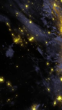 Tiny golden sparks twinkle against the deep black abyss, creating a breathtaking view of the universe. The vast expanse seems alive with celestial wonder and beauty, inviting exploration.